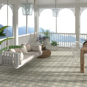 Moroccan patterned floor tiles with soft geometric motifs creating a relaxed veranda setting by Timex Ceramic