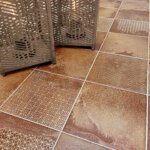 Moroccan textured floor tiles with subtle geometric detailing used in an outdoor setting by Timex Ceramic