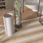 Moroccan linear-pattern ceramic floor tiles in warm neutral tones used in a modern bathroom by Timex Ceramic