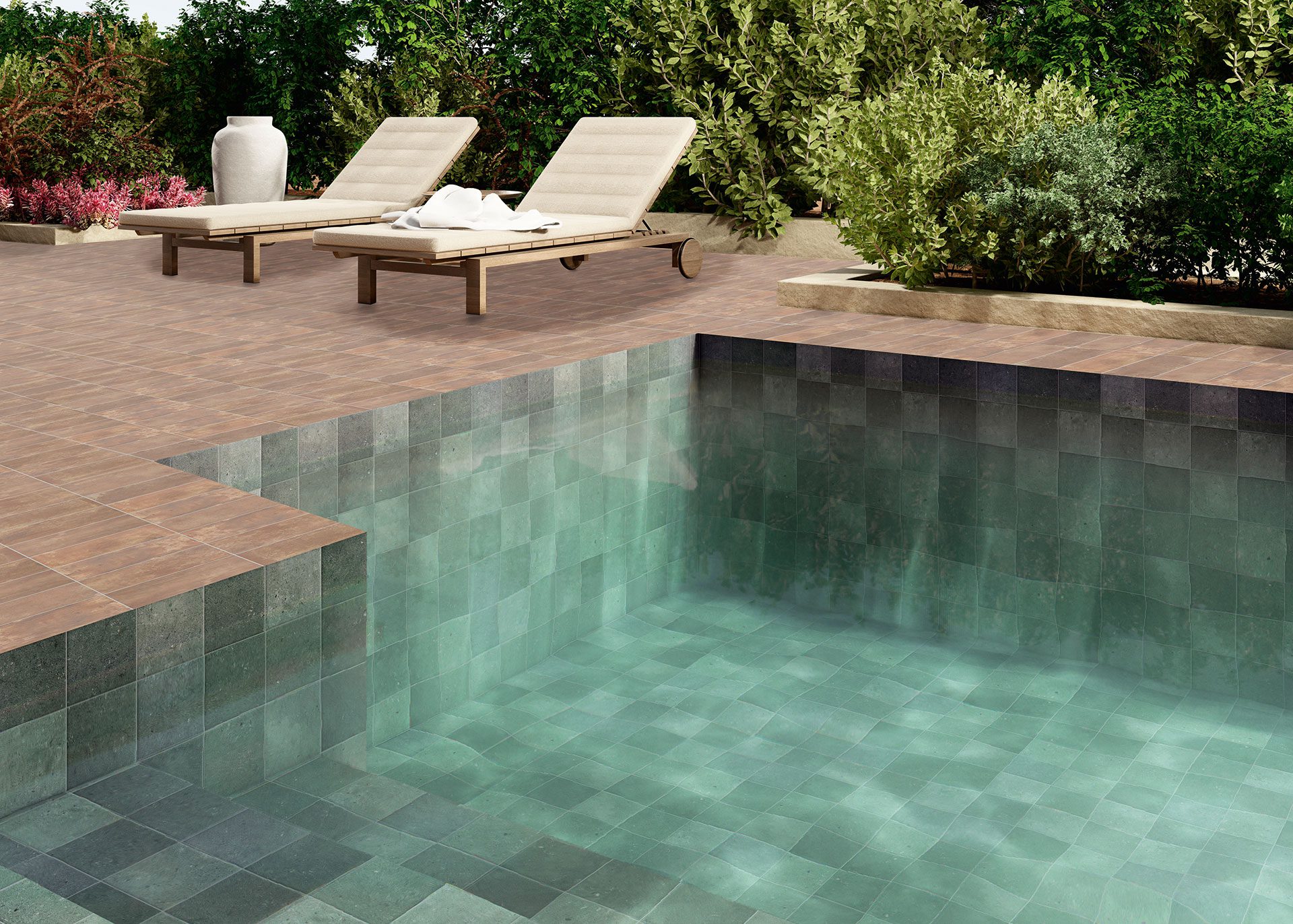 Small-format Moroccan patterned tiles in soft green tones used for pool interiors by Timex Ceramic