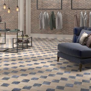 Moroccan geometric floor tiles with a classic pattern used in a stylish living room by Timex Ceramic