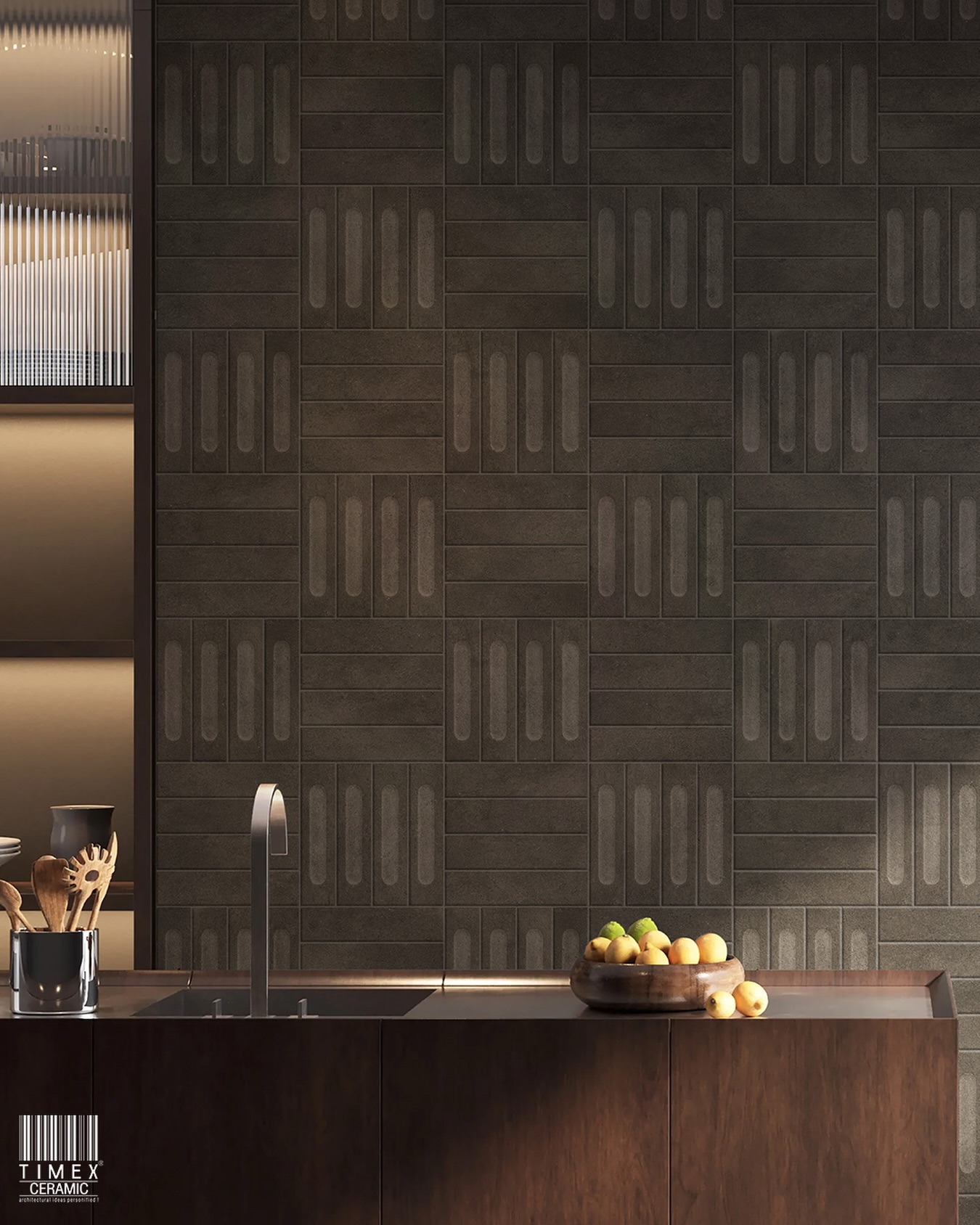 Some surfaces simply fill a wall. Others define the entire space.

SW 23 introduces a structured surface pattern that adds depth and rhythm to interiors. The repeating linear geometry creates a subtle architectural texture, bringing visual movement without overpowering the design.

Its earthy, industrial-toned finish pairs naturally with warm materials like wood, metal, and stone. This balance makes it especially effective in kitchens, feature walls, and contemporary living spaces where material contrast matters.

The modular layout of the pattern allows the wall to feel composed and intentional, turning a functional backsplash into a statement surface.

#TimexCeramic #FeatureWallTiles #KitchenBacksplashTiles #ArchitecturalSurfaces #TileDesignIndia