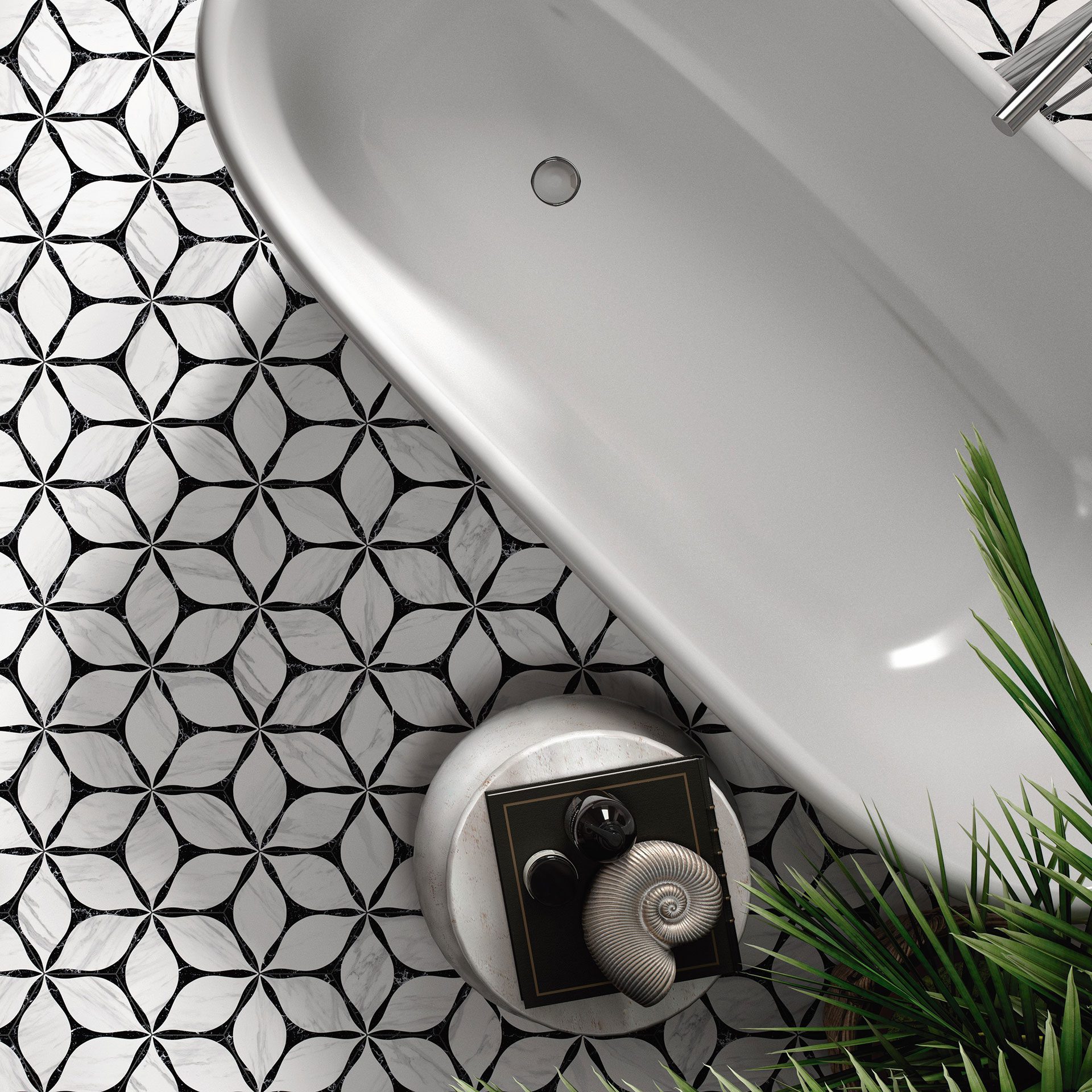 Black and white floral geometric floor tiles in a luxury bathroom with freestanding tub