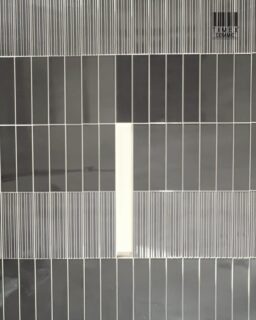 A monochromatic wall, made interesting by the way the surface changes.
The Lumina 60 × 246 series brings together two complementary expressions in grey: a clean plain tile and a linear textured version. The colour stays restrained and architectural, allowing the surface variation to become the defining detail.
The plain tile creates a calm, consistent base, while the lined tile introduces a fine vertical rhythm across the wall. Used together, the contrast is subtle but intentional, adding depth without relying on bold pattern or multiple colours.
The 60 × 246 mm format further strengthens that linear character. The elongated proportion works particularly well in contemporary kitchens and backsplashes, where the direction of the lines can be used to create visual continuity and structure.
It is a good example of how one colour, two surfaces and a considered format can create a layered interior.
Lumina
Finish: Plain + Linear textured
Application: Wall
Size: 60 × 246 mm
#TimexCeramic #LuminaSeries #WallTileDesign #KitchenInteriors #TileDesign
